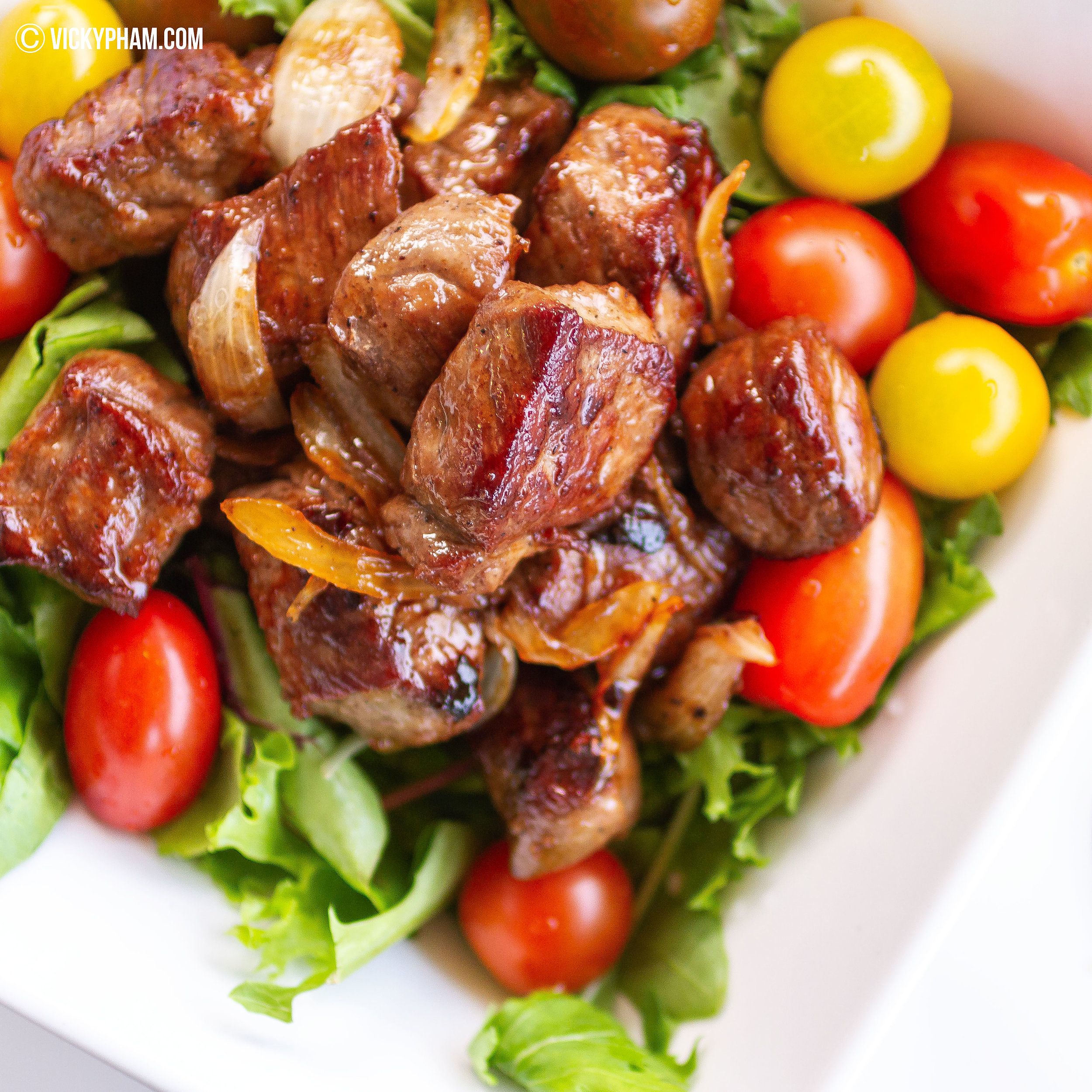 Vietnamese Shaking Beef served with a lime-salt-pepper dipping sauce