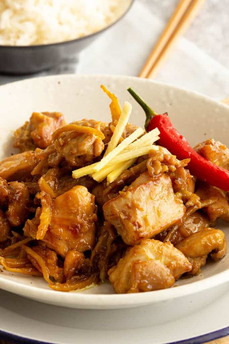 Bowl of Ga Kho Gung topped with ginger and fresh chilli.