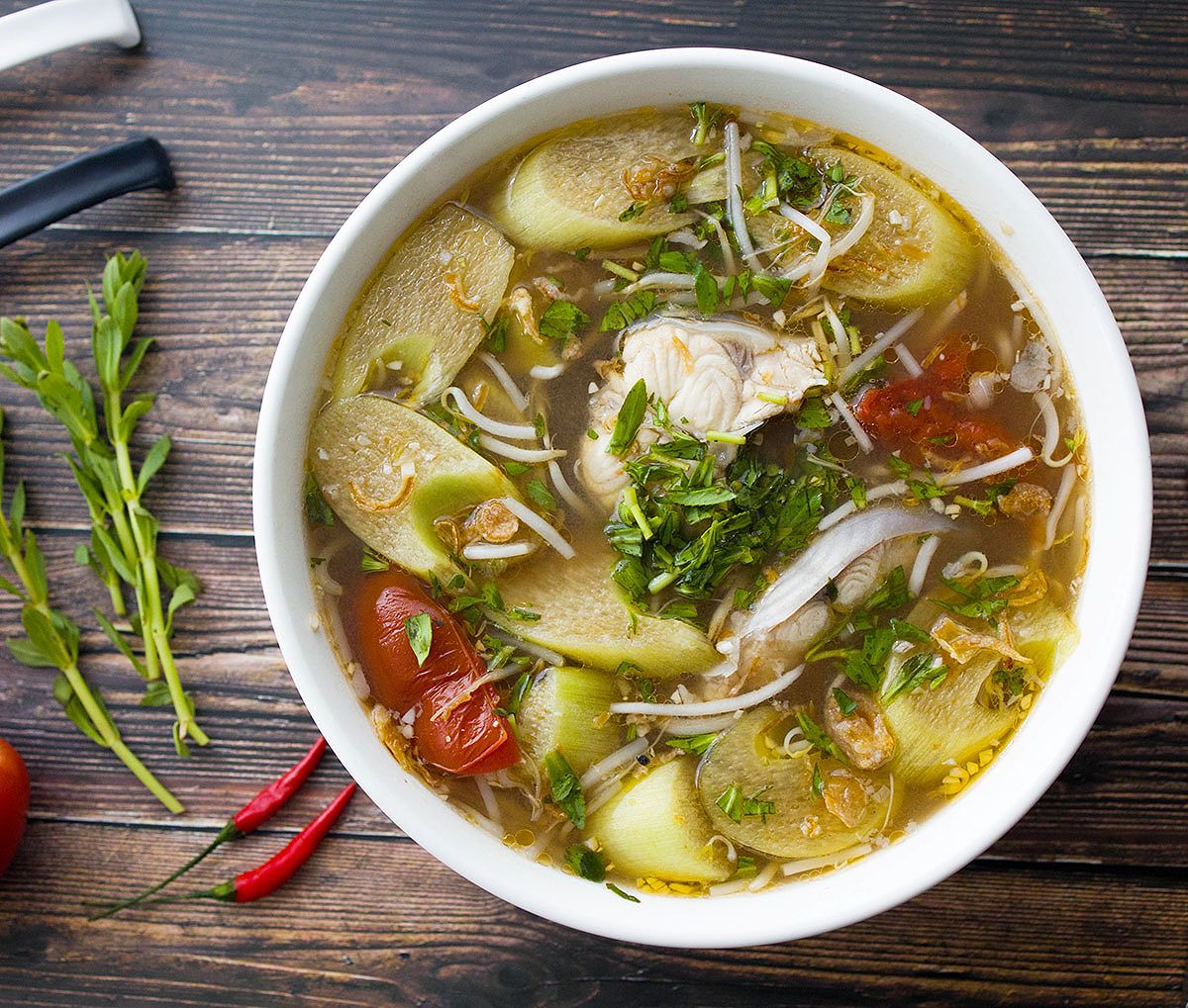 Canh Chua Ca served in a bowl.