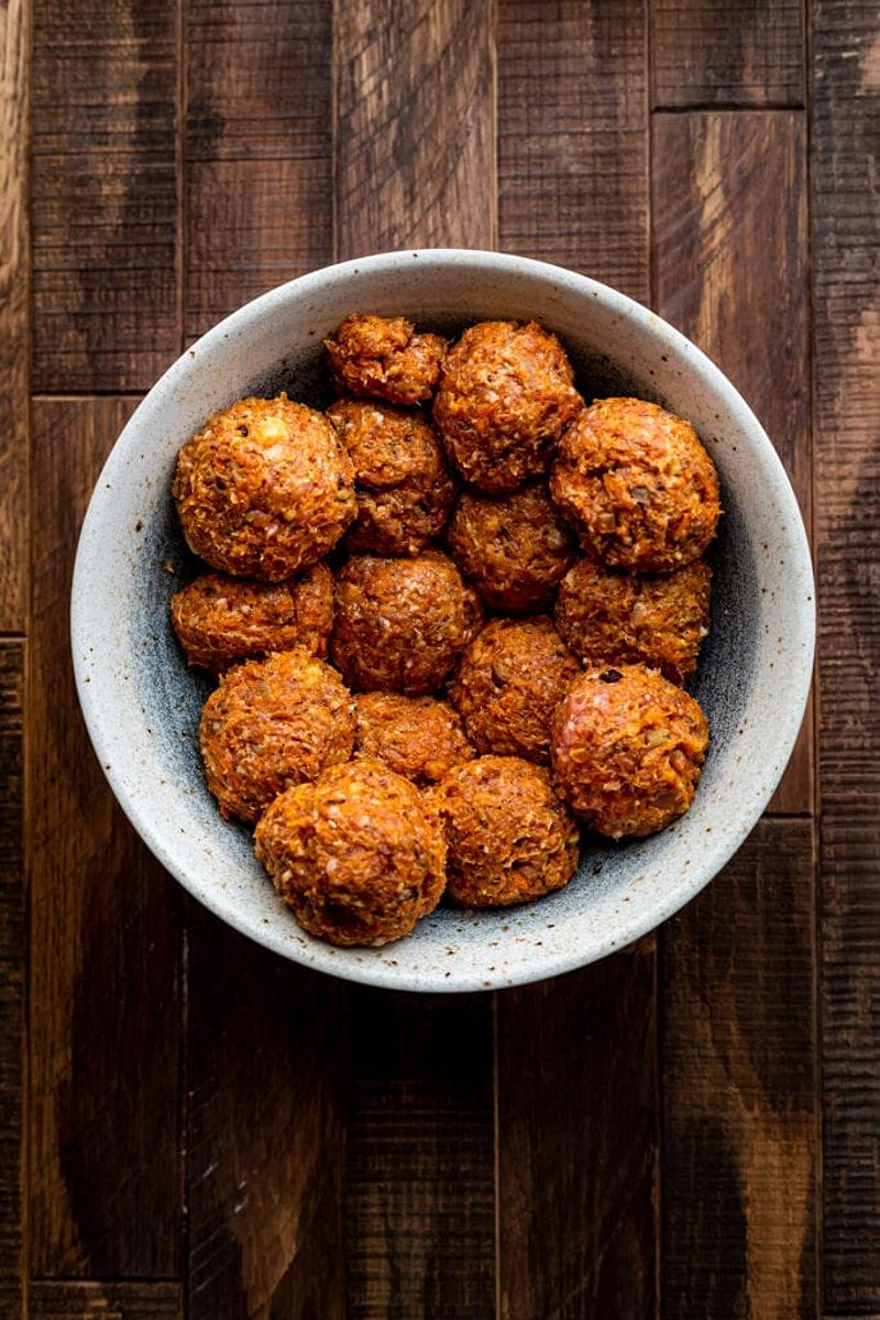 Formed Vietnamese meatballs in a bowl