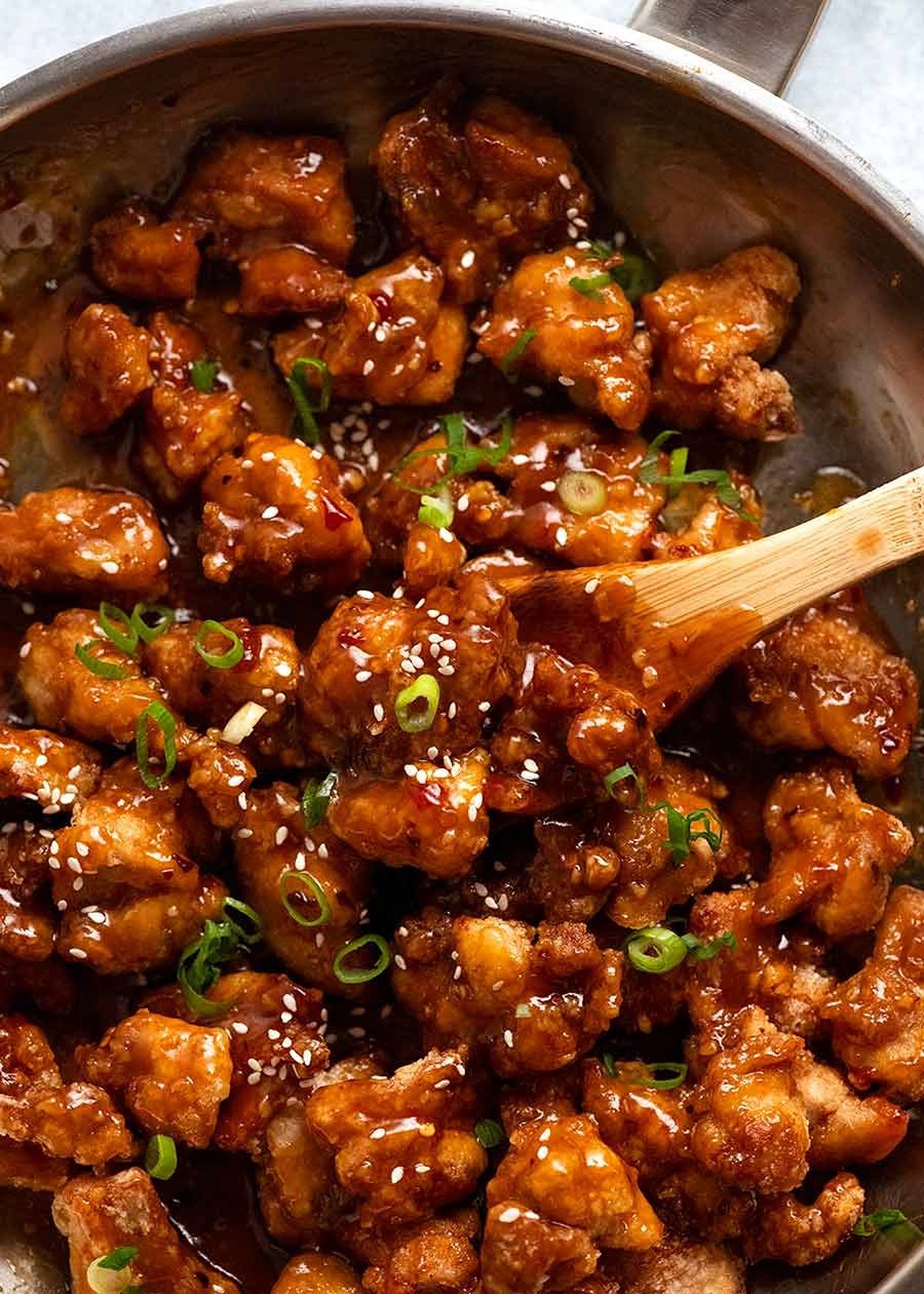 General Tso's Chicken simmering in a skillet