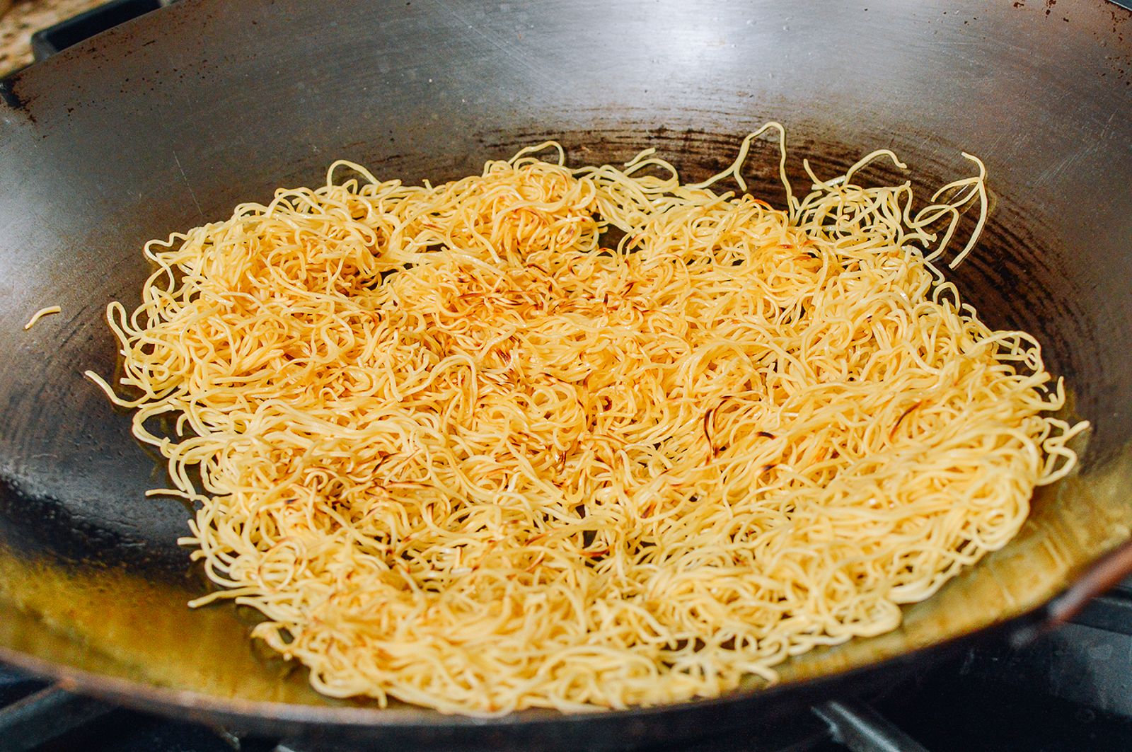 Pan-frying noodles in wok