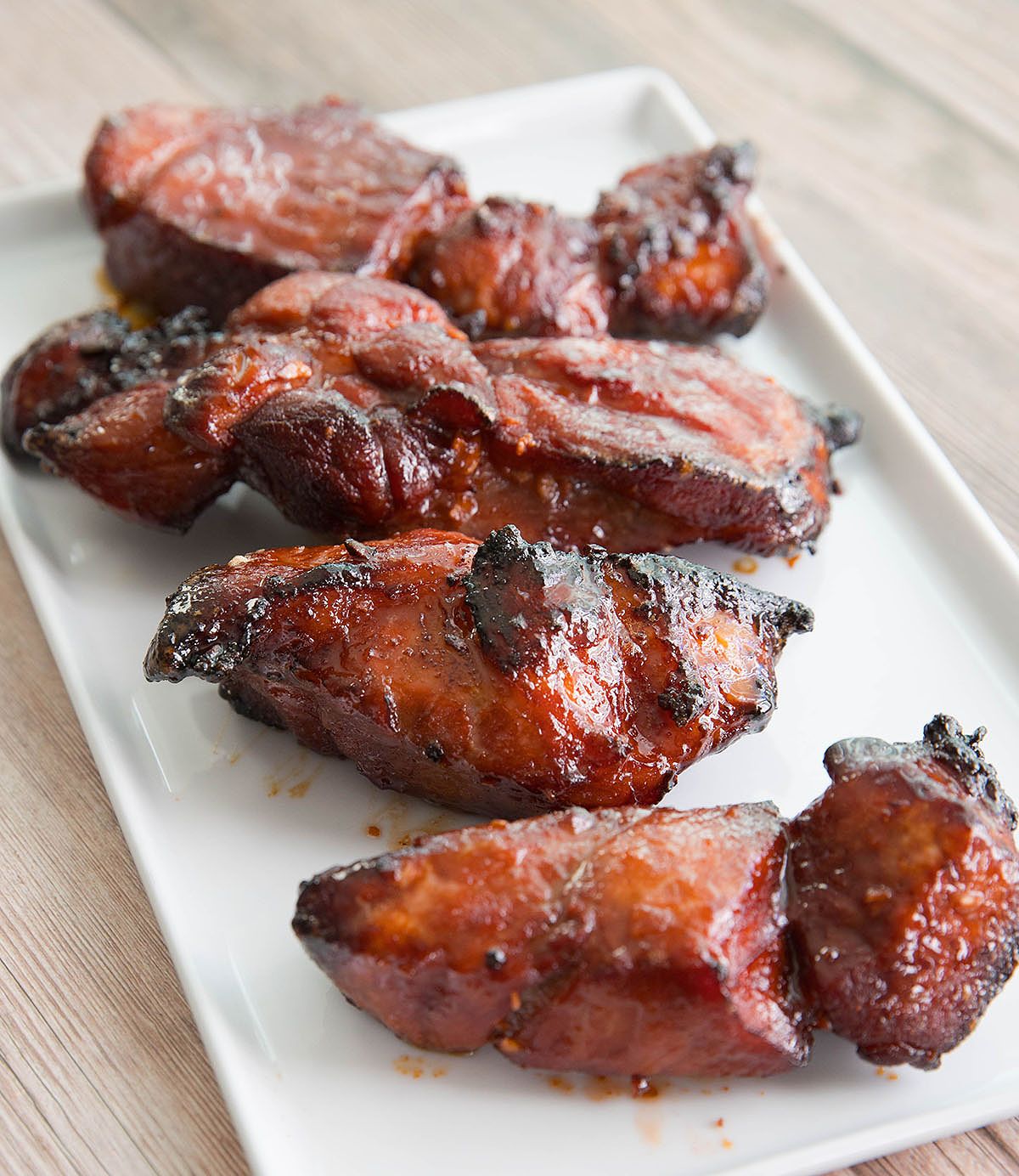 Several pieces of air fryer char siu on a plate