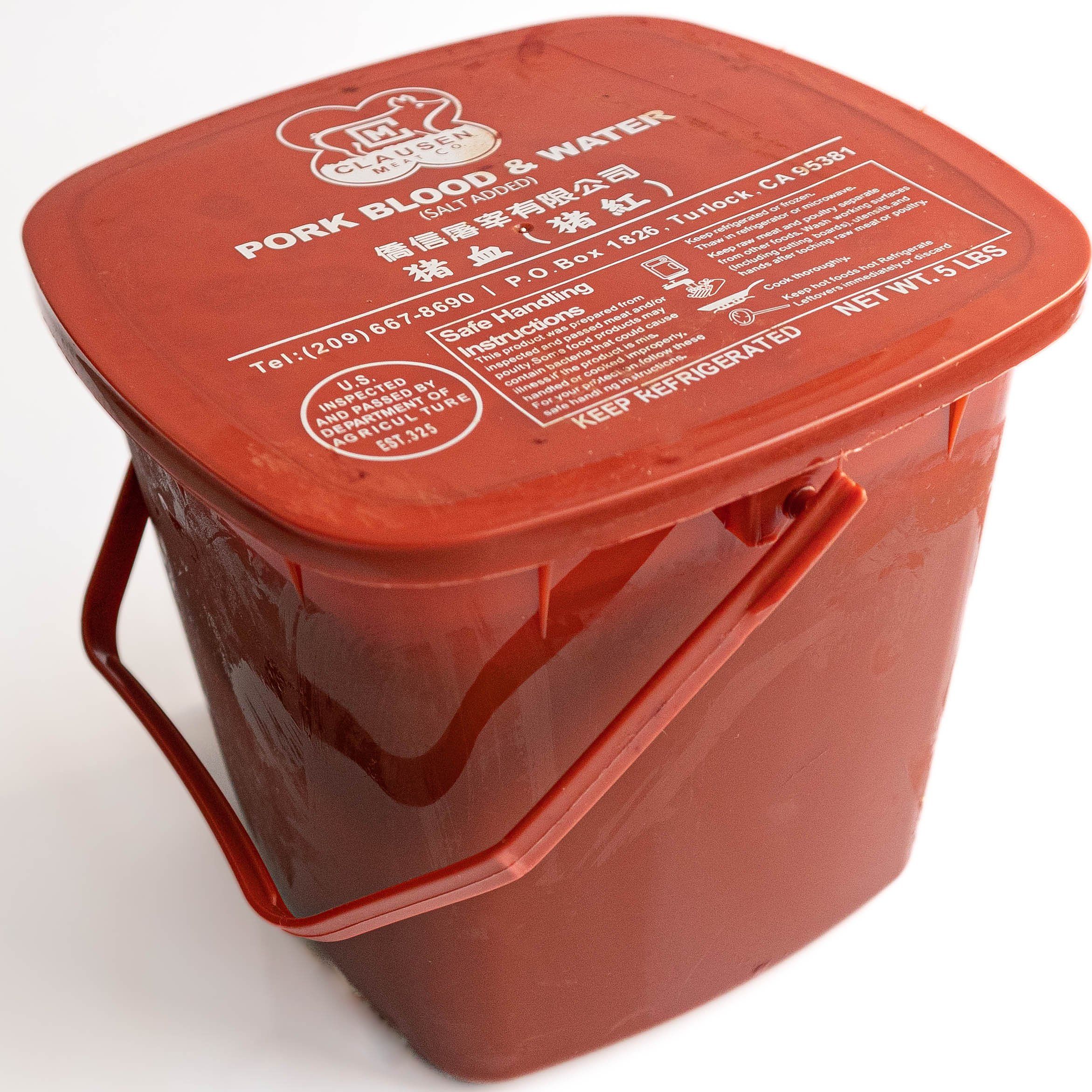 You might see this red pail at the Asian grocery store. This is a large quantity of raw congealed pork blood.